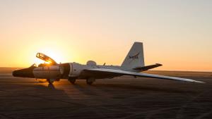 The Sun sets behind a NASA WB-57F Canberra research aircraft