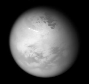 Cassini view of Titan lakes, clouds