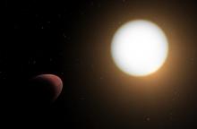 Illustration of a star and its nearby planet, which is distorted into a rugby-ball shape