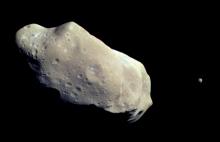 Galileo view of asteroid Gaspra and its moon, Ida