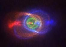 a nebula surrounds a dying star