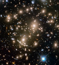 Hubble view of Abel 370 galaxy cluster with intervening asteroids 