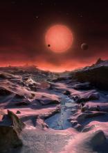 The faint star Trappist-1 and three of its planets