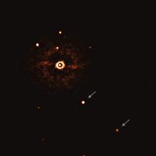 Two giant planets are visible in this view of TYC 8998-760-1