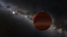 artist's concept of a system with a white dwarf and a brown dwarf